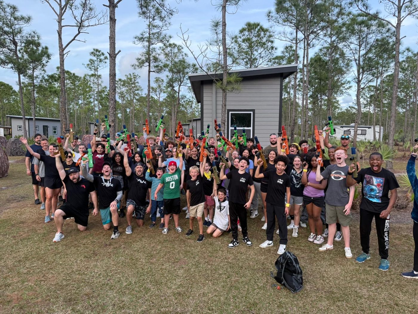 Gold and White Star kids with mentors at an Operation 300 weekend adventure camp.